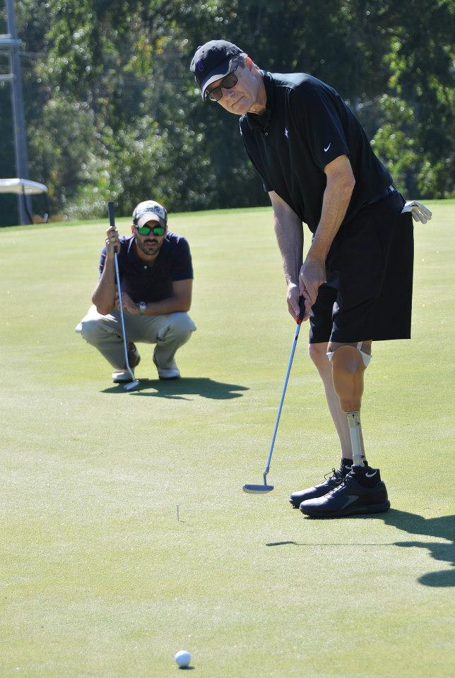 Fred playing golf