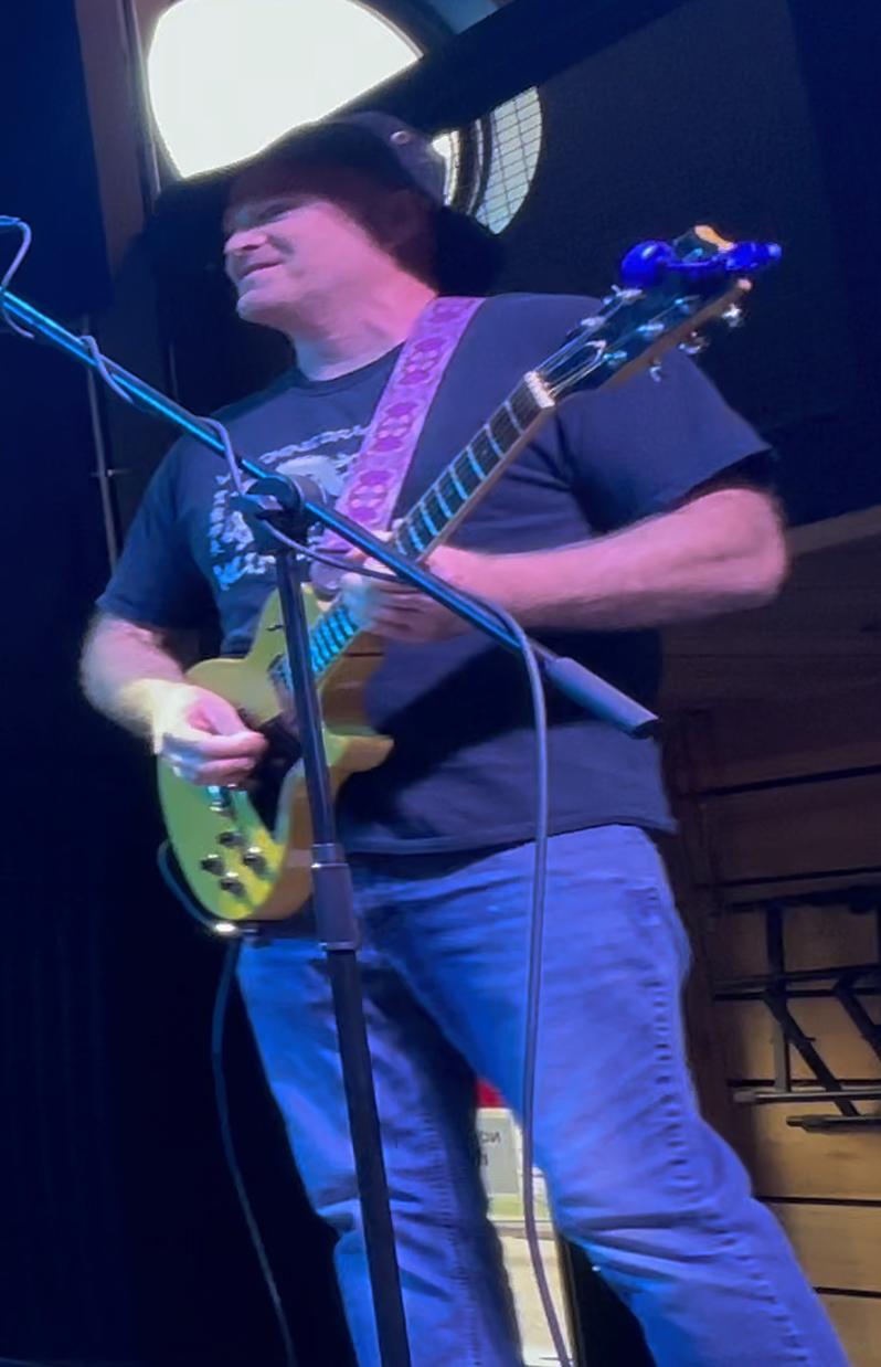 Chris Carlson on guitar