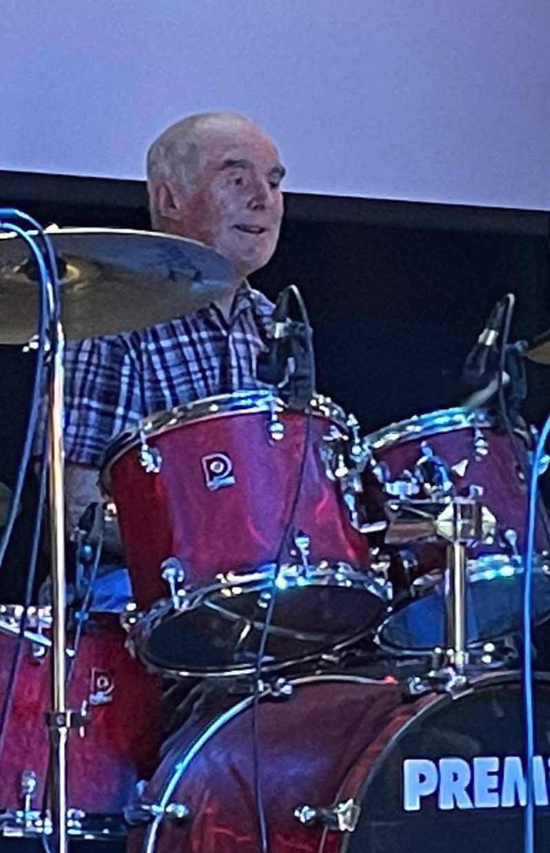 John Elliot on drums